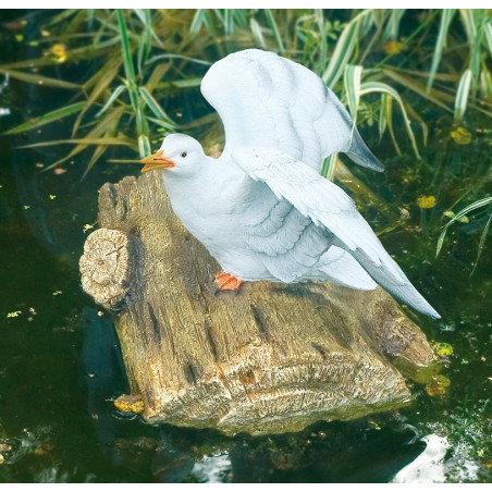 Gargouille Mouette flottante sur rondin bois qui prends son envol